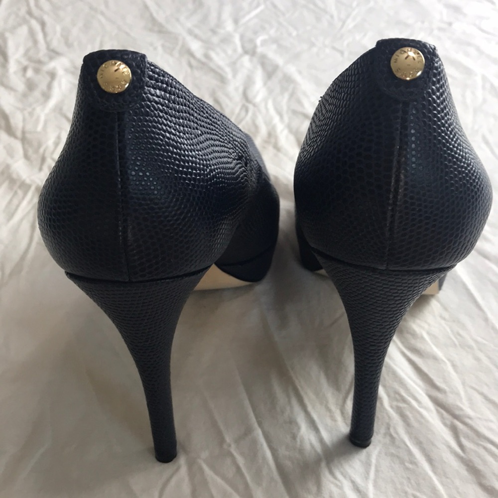 Michael Kors dark navy blue heels.
